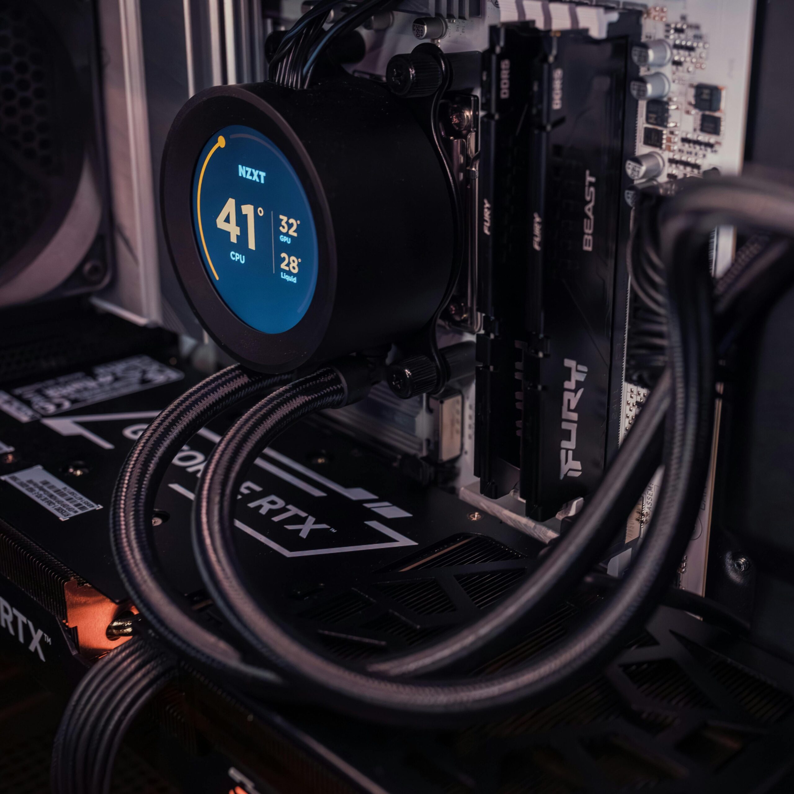 Internal view of a gaming PC showcasing advanced cooling and graphics capability.